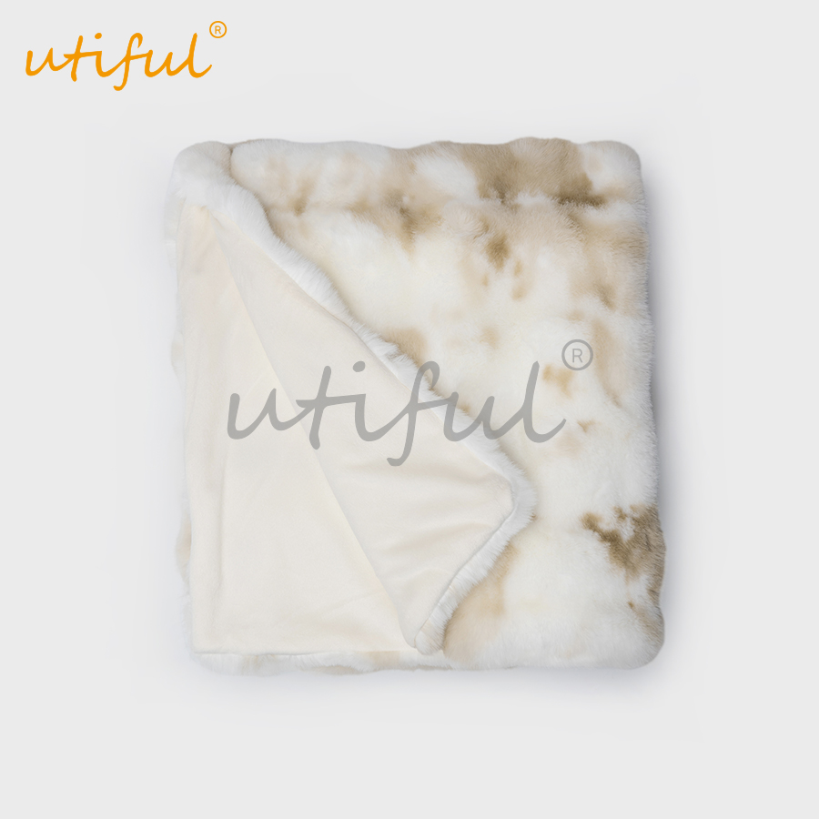 Printed faux fur throw blanket